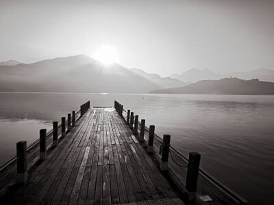 Taiwan  | The sun rising above the mountains surrounding Sun Moon Lake, in the Nantou region of Taiwan.
